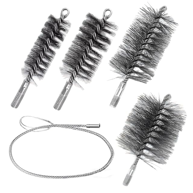 A set of four steel flue brushes of 30, 50, 80 and 150 millimetres with a wire rope