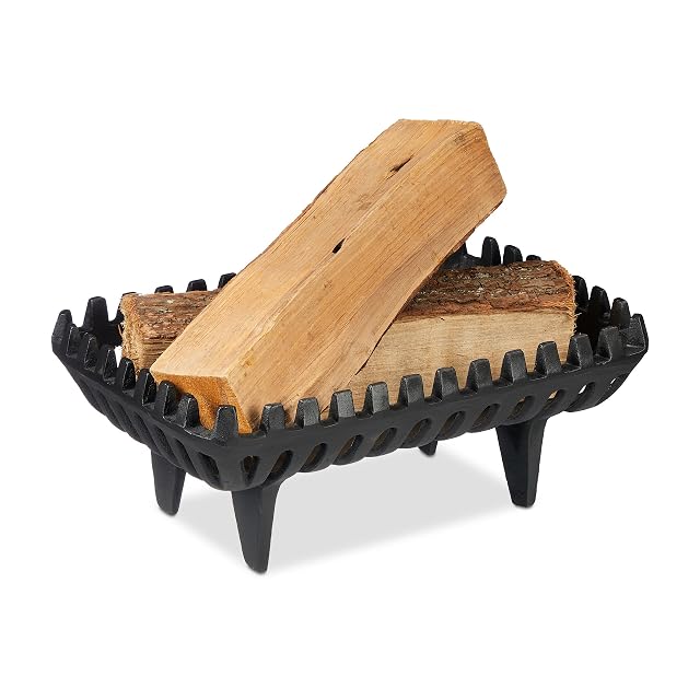 A black cast iron standing fire grate on four legs, 37 centimetres wide and 15 centimetres high