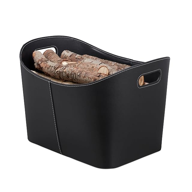 A black oval faux leather log basket with two carrying handles