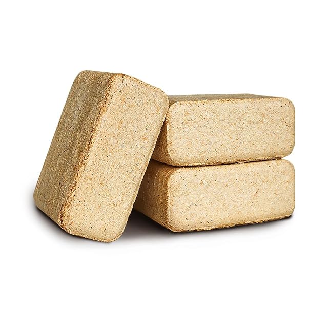 Two shrink-wrapped packs of twelve pine wood briquettes measuring 155 by 100 by 65 millimetres